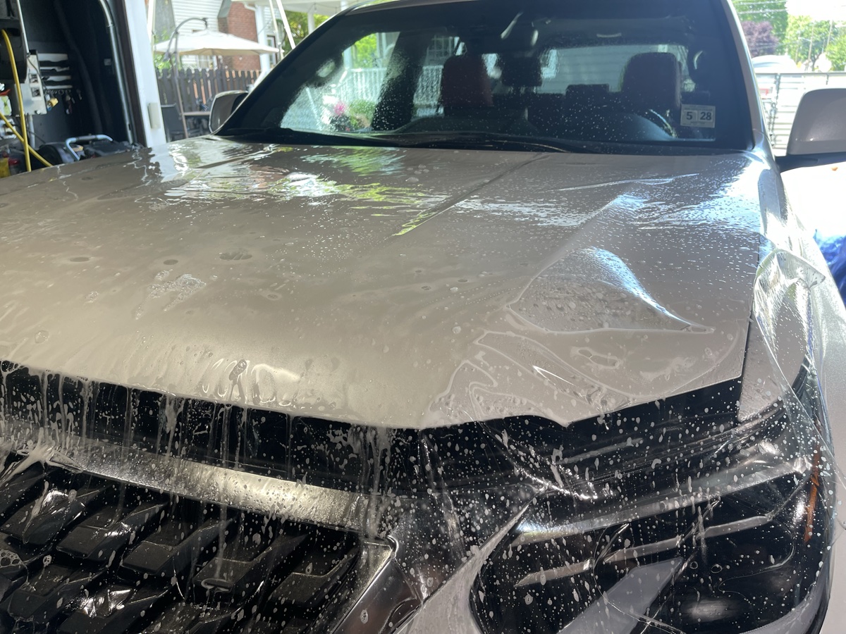 LLumar Valor PPF hood installation on SUV at CBA Detailing Bergen County NJ