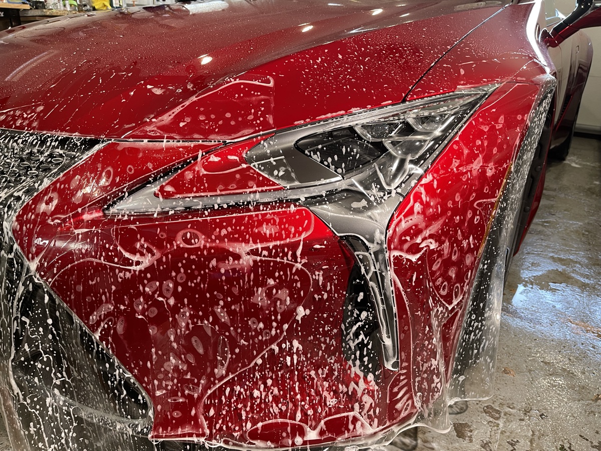 LLumar Valor PPF on red Lexus LC front headlight at CBA Detailing Bergen County NJ