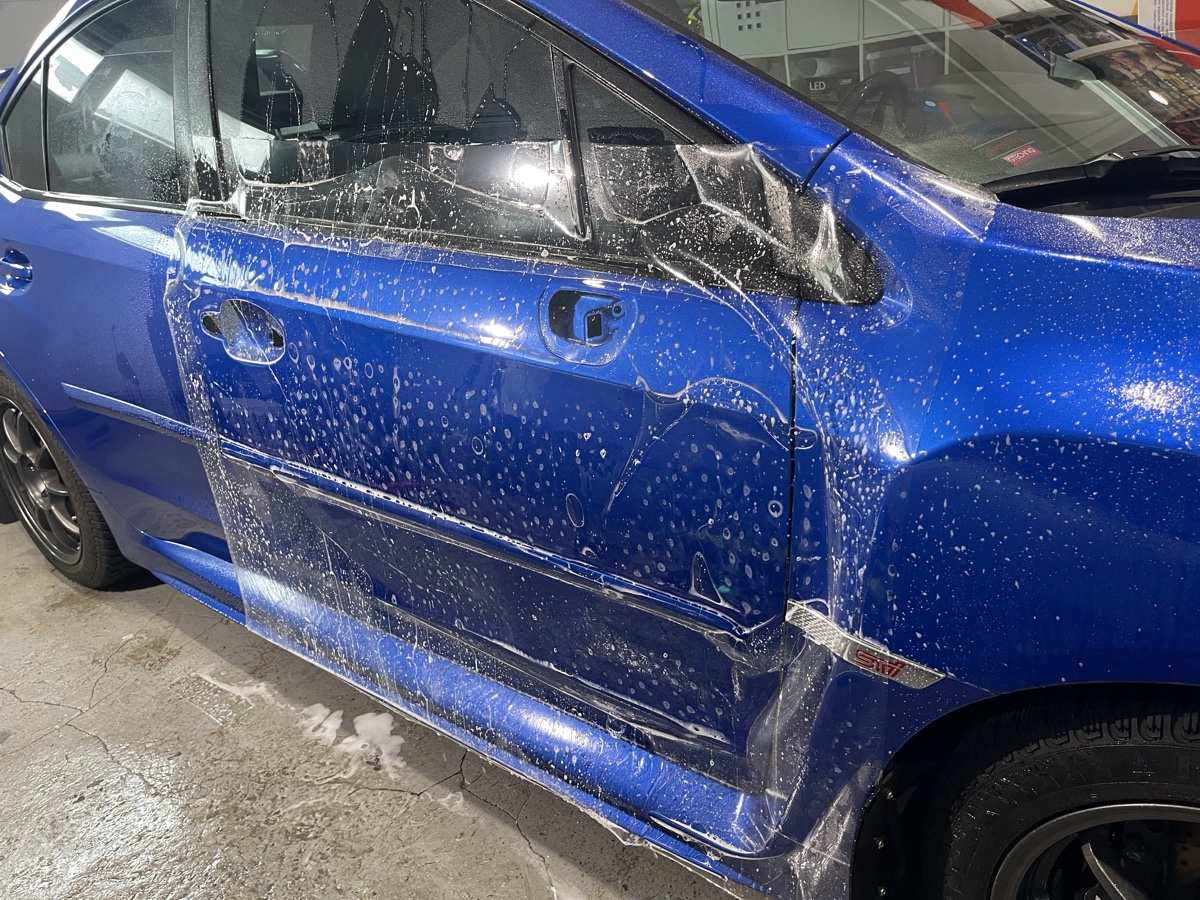 LLumar Valor PPF on blue Subaru WRX STI door panel at CBA Detailing NJ